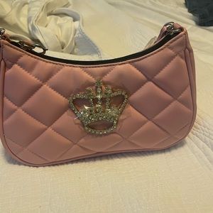 Small pink brand new My Flat in London purse with black bag